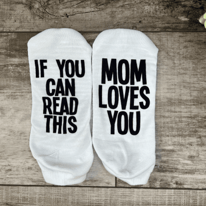 if you can read this mom loves you socks printed on a crew or ankle length sock