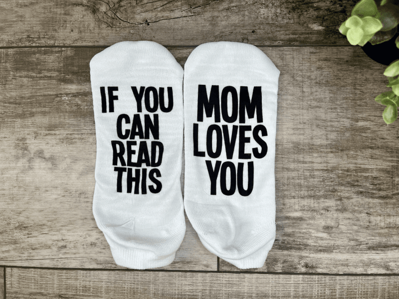 if you can read this mom loves you socks printed on a crew or ankle length sock