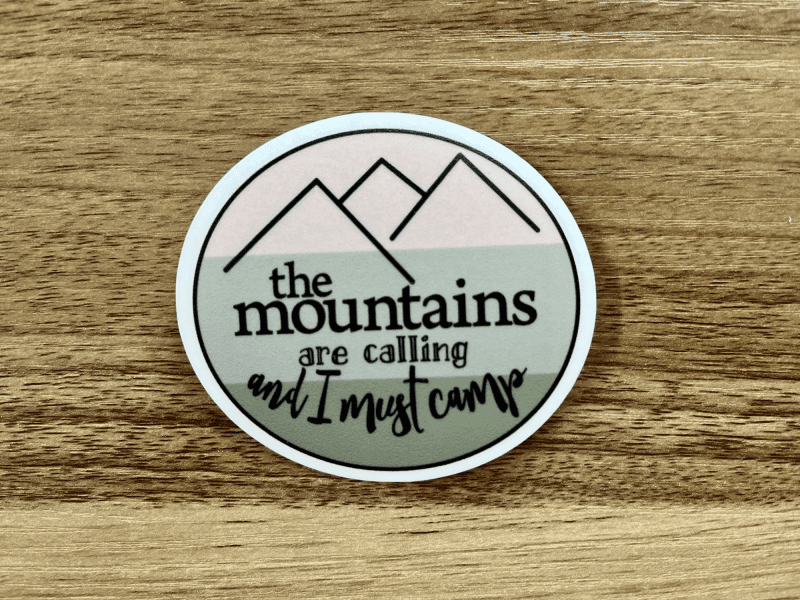 The mountains are calling and I must camp 3" circle sticker